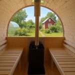 Parete posteriore panoramica in vetro per sauna a botte
